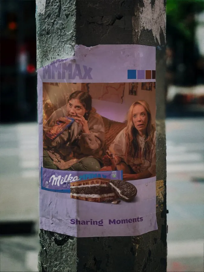 Sharing Moments wheatpaste on a street pole