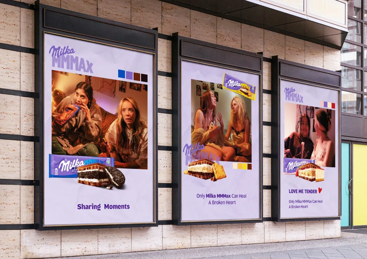 MMMAX posters on a building facade